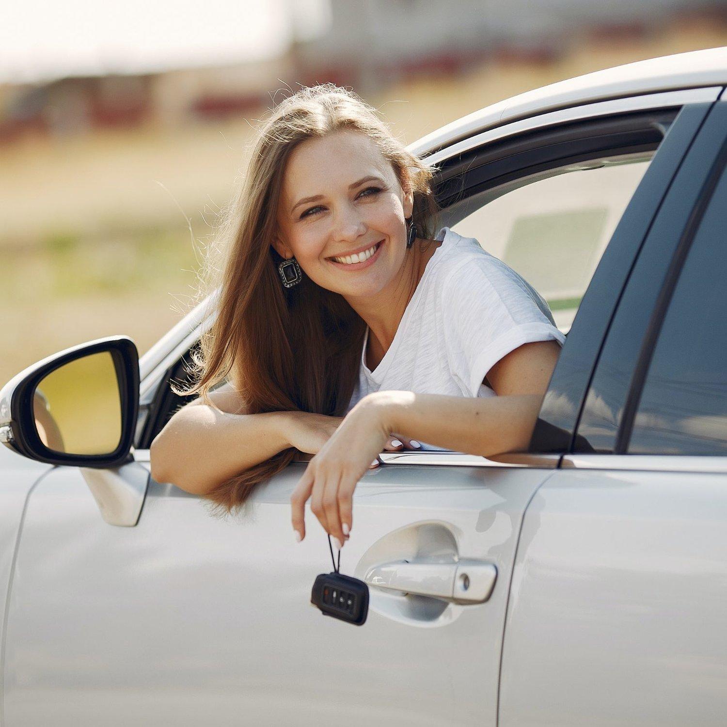 Woman renting a car